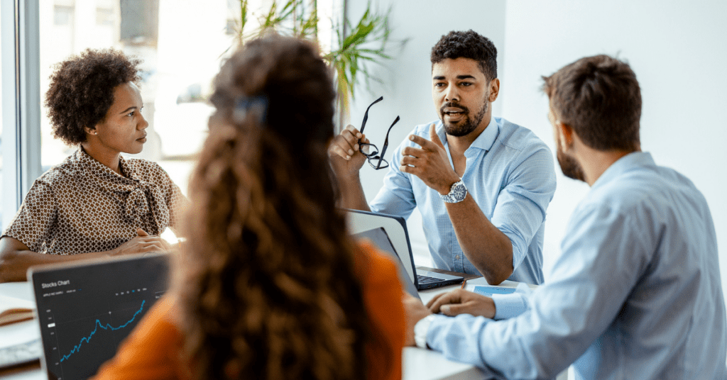 marketing team discussing marketing automation features